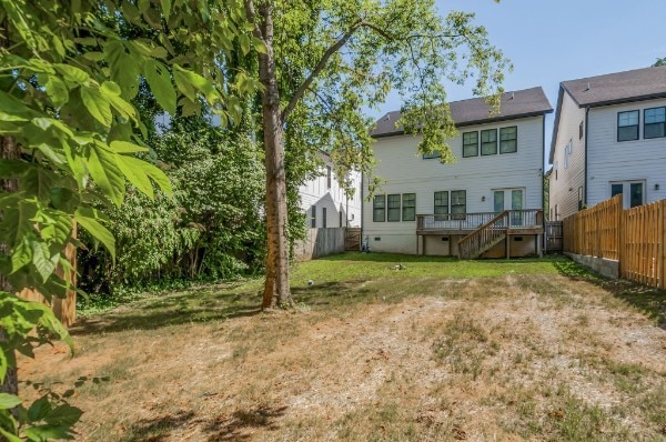 view of yard with a wooden deck