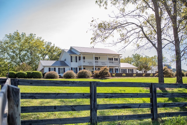 view of front of home with a front lawn