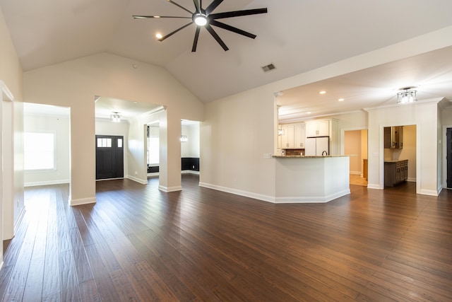 unfurnished living room with ornamental molding, lofted ceiling, ceiling fan, and dark hardwood / wood-style flooring