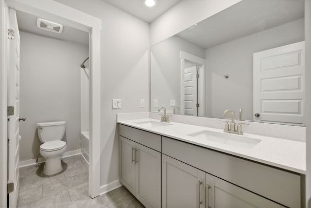 full bathroom featuring shower / bathing tub combination, tile patterned floors, vanity, and toilet