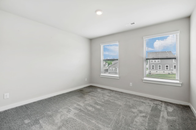 view of carpeted spare room