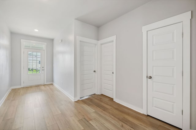 foyer entrance featuring light hardwood / wood-style flooring