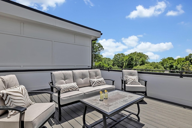 wooden deck featuring outdoor lounge area