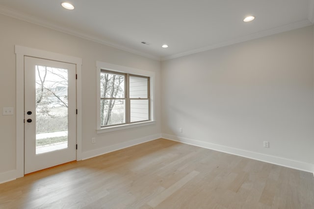 interior space featuring light hardwood / wood-style flooring and ornamental molding