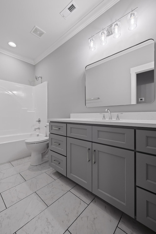 full bathroom featuring crown molding, bathing tub / shower combination, vanity, and toilet