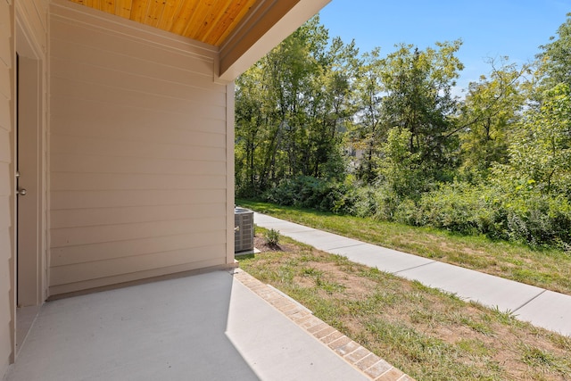 exterior space with a patio area and central AC