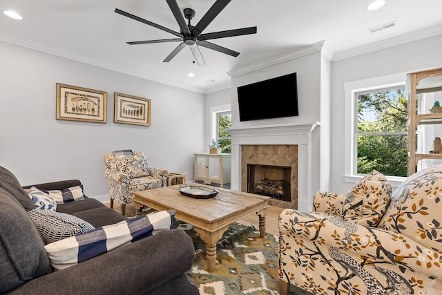 living area with visible vents, recessed lighting, wood finished floors, ceiling fan, and a fireplace