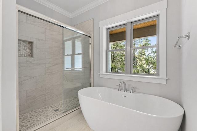 bathroom featuring plus walk in shower, tile patterned floors, and crown molding