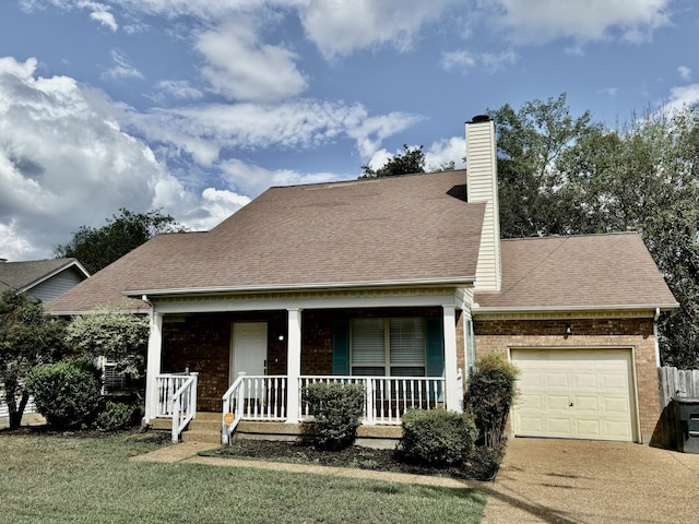 view of front facade featuring covered porch, a front lawn, and a garage