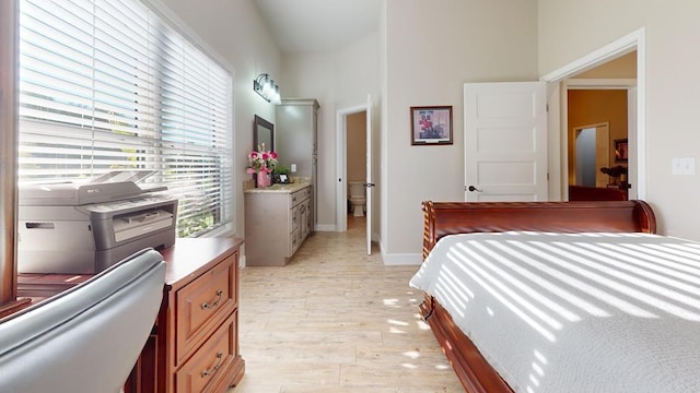 bedroom with light hardwood / wood-style floors