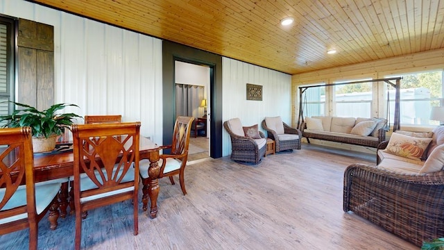 sunroom / solarium featuring wood ceiling