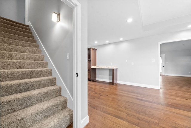 stairway with wood-type flooring