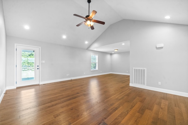 unfurnished living room with high vaulted ceiling, ceiling fan, and dark hardwood / wood-style flooring