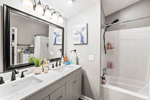 bathroom featuring vanity, lofted ceiling, and shower / tub combo with curtain