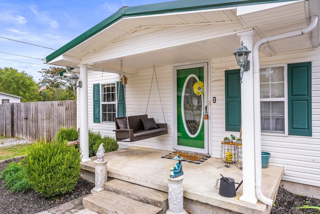 entrance to property with a porch