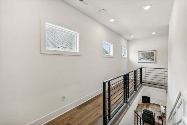 staircase featuring hardwood / wood-style flooring