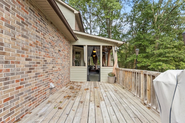 wooden terrace with grilling area