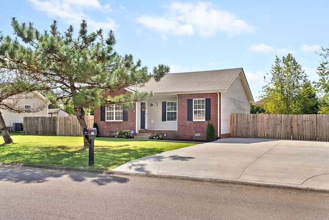 single story home featuring a front lawn