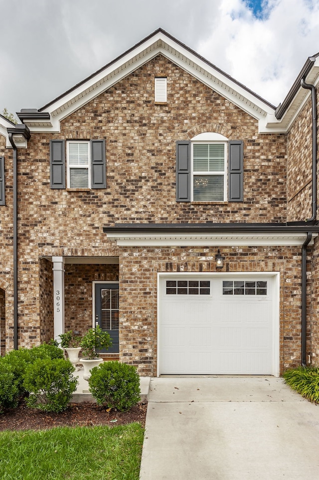 view of front of property with a garage