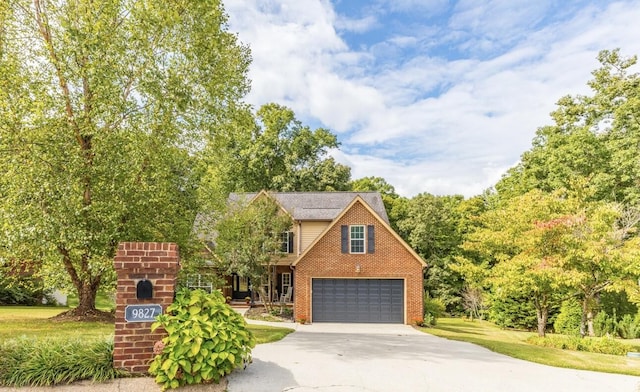 view of front of property featuring a garage