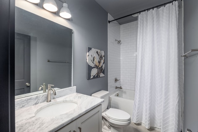 full bathroom with shower / bath combo, vanity, and toilet