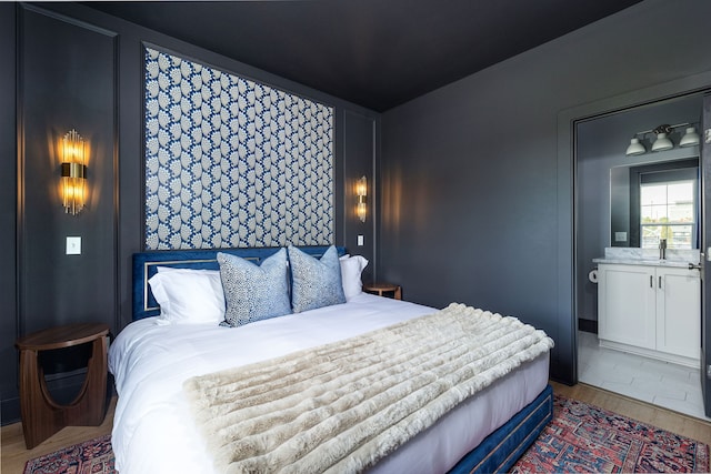 bedroom featuring wood-type flooring