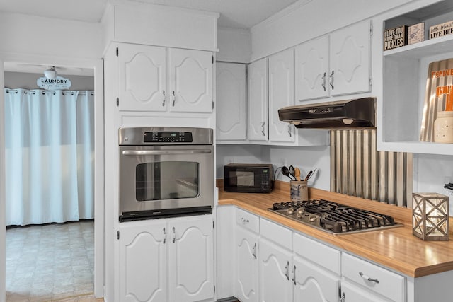 kitchen with white cabinetry and stainless steel appliances