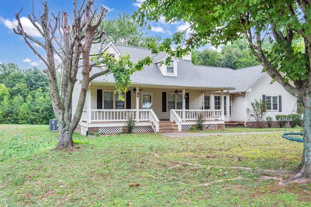 view of front of home with a porch and a front lawn