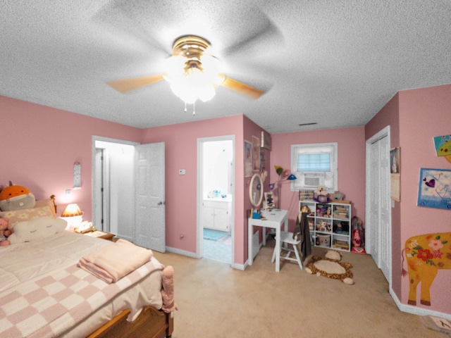 bedroom with ceiling fan, a textured ceiling, and light carpet