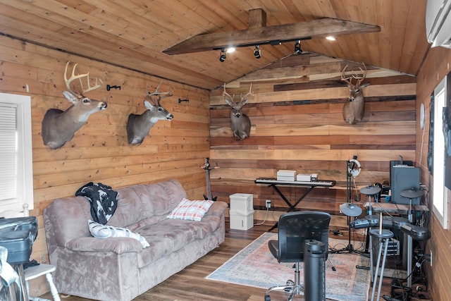 interior space featuring wood walls, a wall mounted AC, lofted ceiling with beams, dark hardwood / wood-style floors, and wooden ceiling