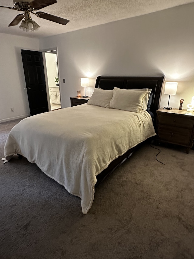 carpeted bedroom featuring ceiling fan, a textured ceiling, and connected bathroom