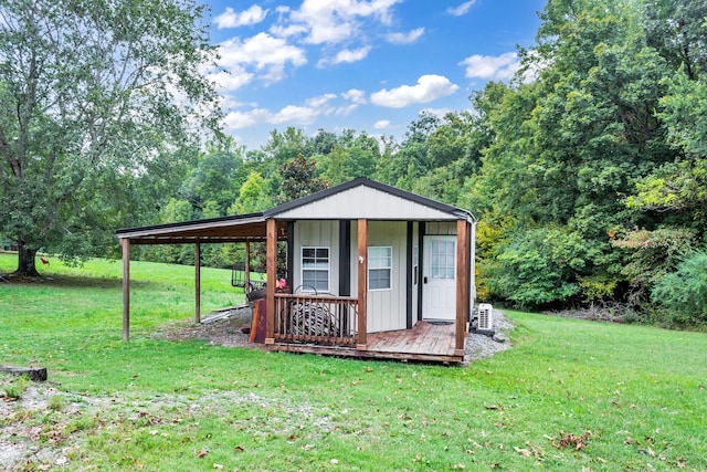 view of outdoor structure with a lawn