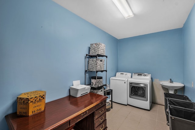 laundry area featuring sink and independent washer and dryer