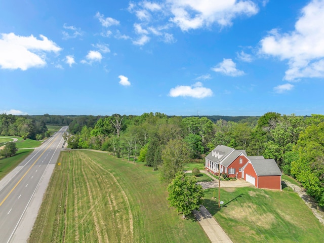 birds eye view of property featuring a rural view