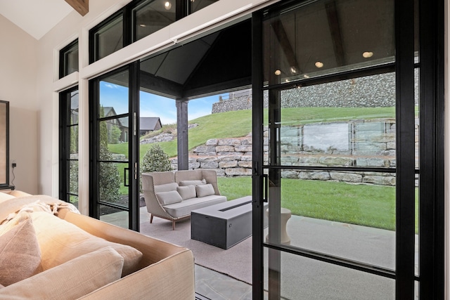 doorway to outside with lofted ceiling and light carpet