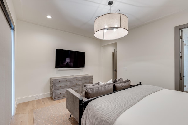 bedroom featuring light hardwood / wood-style floors