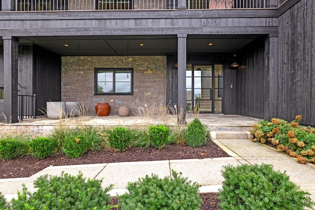 property entrance with a balcony