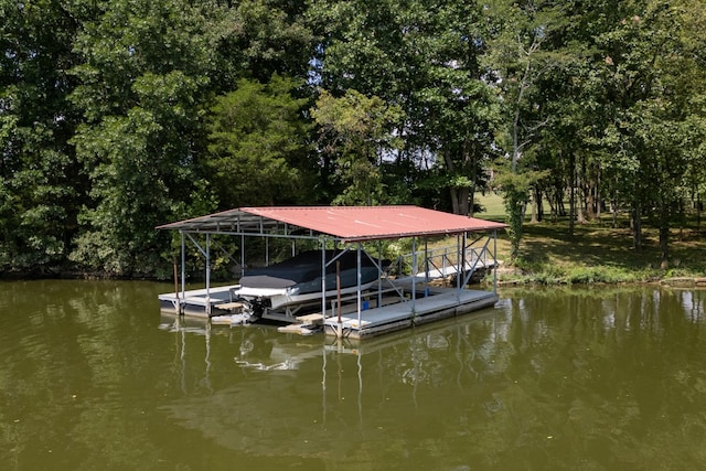 dock area featuring a water view