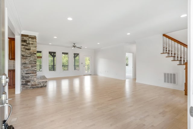 unfurnished living room featuring ornamental molding, light hardwood / wood-style flooring, and ceiling fan