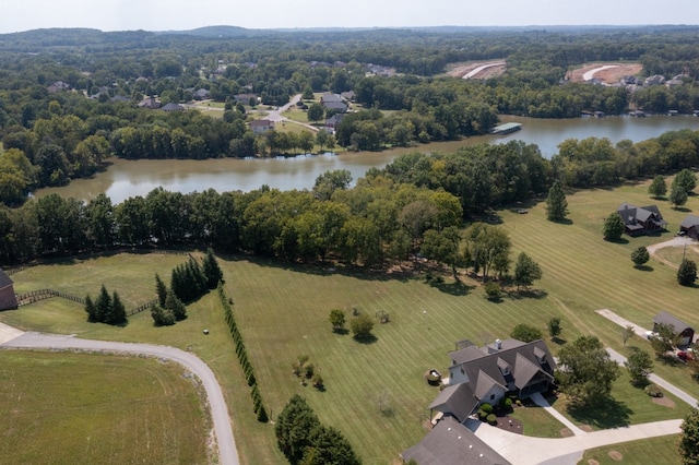 birds eye view of property featuring a water view and a rural view