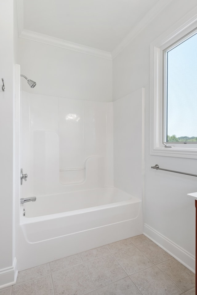 bathroom featuring ornamental molding, bathtub / shower combination, and tile patterned floors