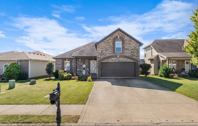 view of front of home featuring a front lawn and a garage