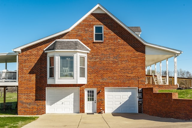 view of side of property featuring a garage