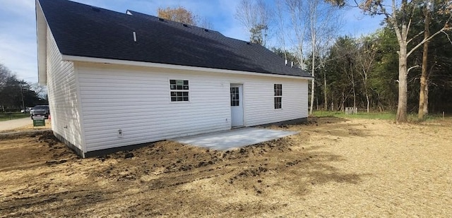 back of property with a patio area