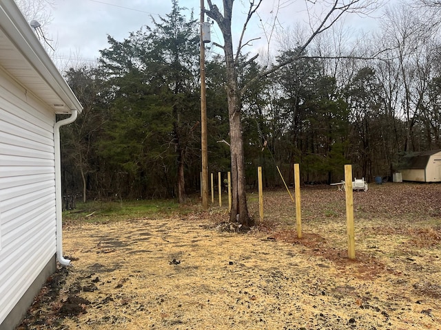 view of yard with a shed