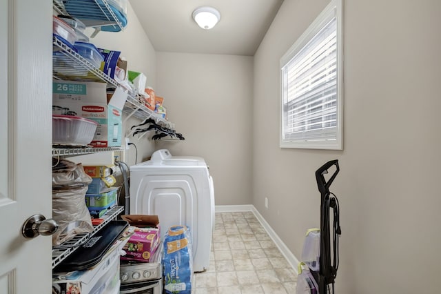 washroom with independent washer and dryer