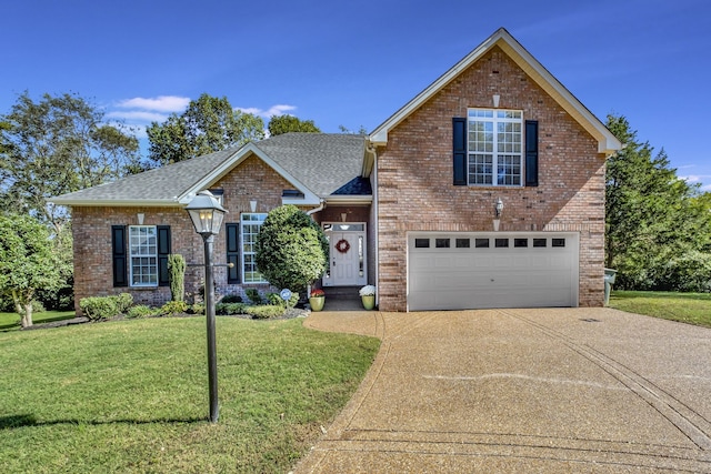 view of property with a garage and a front lawn