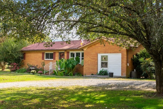 ranch-style house with a front yard