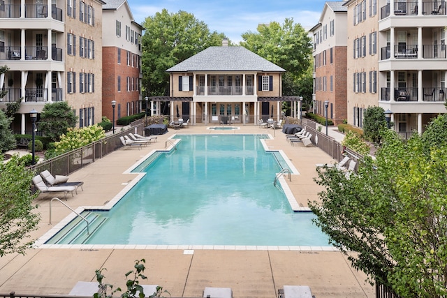 view of pool featuring a patio