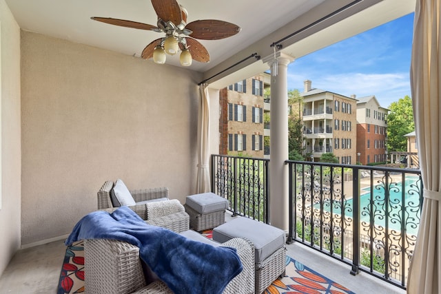 balcony featuring ceiling fan